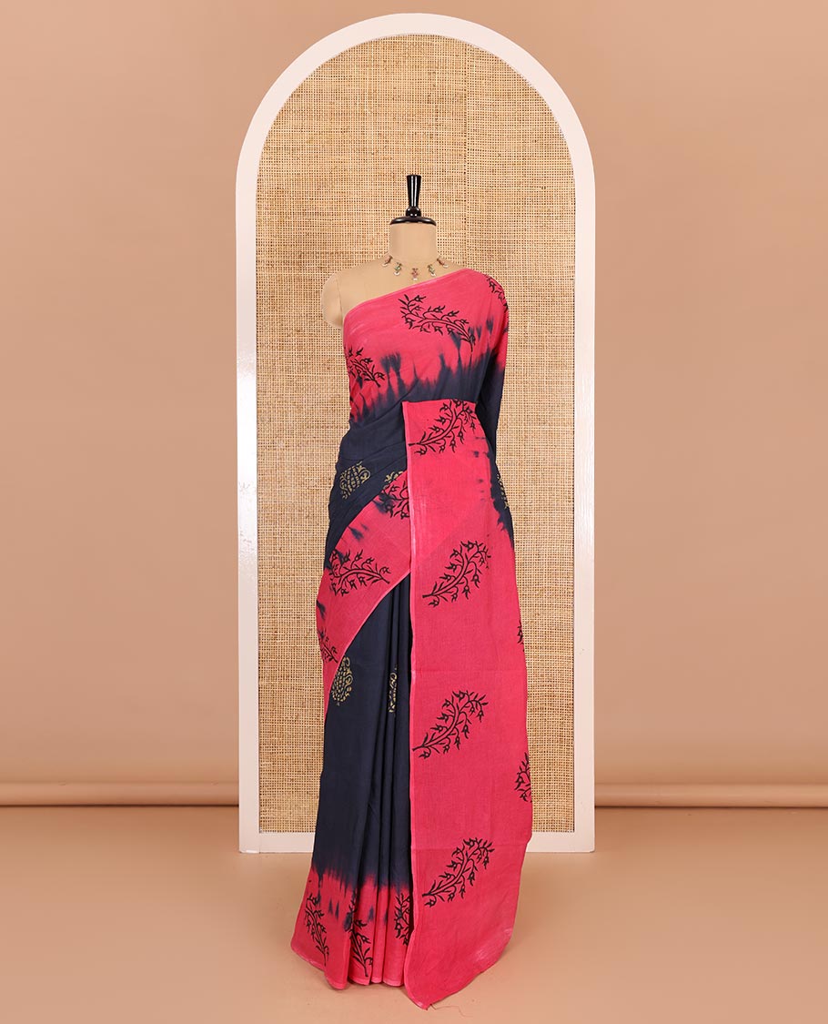 Navy blue paisley motifs block printed mul cotton saree, contrast leaf motifs block printed border, leaf motifs printed pallu, and contrast plain blouse