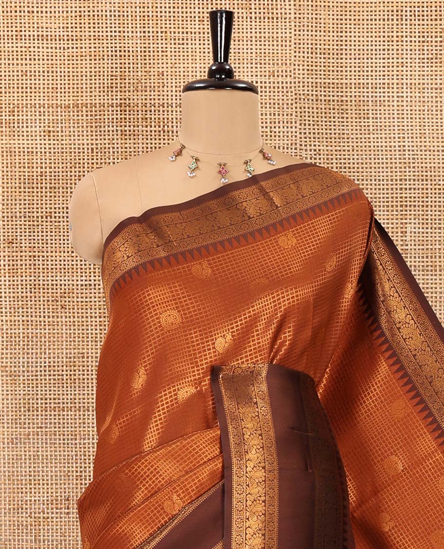 Rust orange-brown checked and peacock chakra zari buttas kanchi silk saree, contrast traditional zari rettai pettu border, jaal pallu, and a jacquard blouse