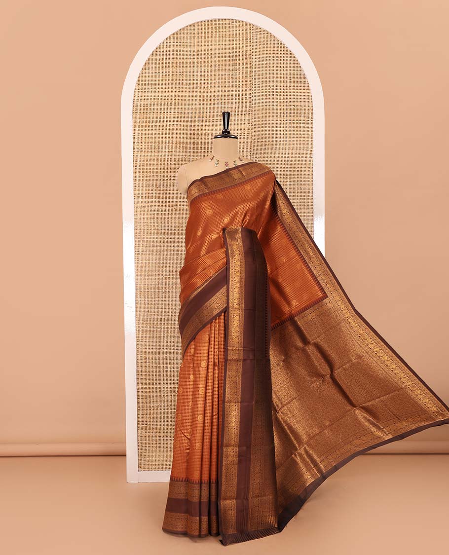 Rust orange-brown checked and peacock chakra zari buttas kanchi silk saree, contrast traditional zari rettai pettu border, jaal pallu, and a jacquard blouse