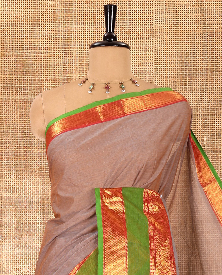 Beige plain Chettinad cotton saree, contrast traditional zari rettai pettu border, striped pallu, and a matching blouse