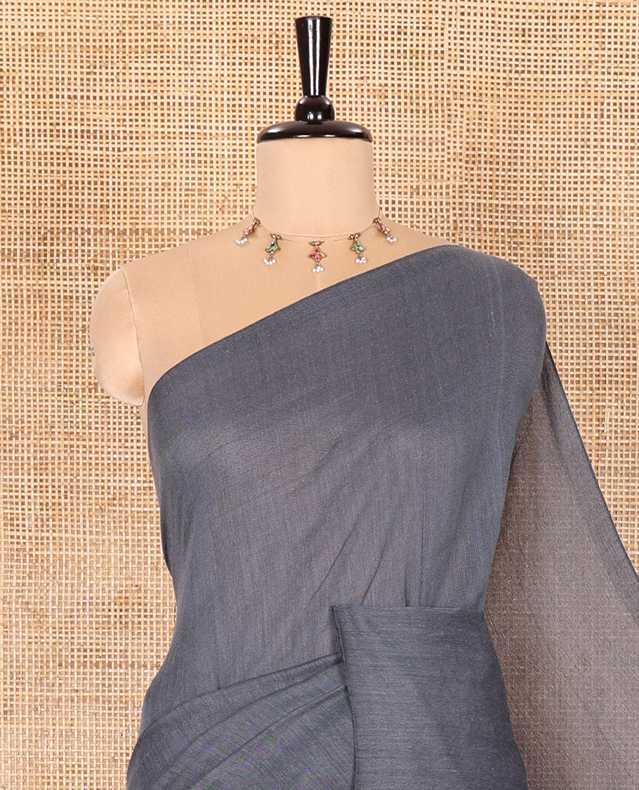 Borderless Elephant Grey Plain Khadi Mul Cotton Saree Featuring a Self Pallu with Tassels, Paired with a Matching Plain Blouse