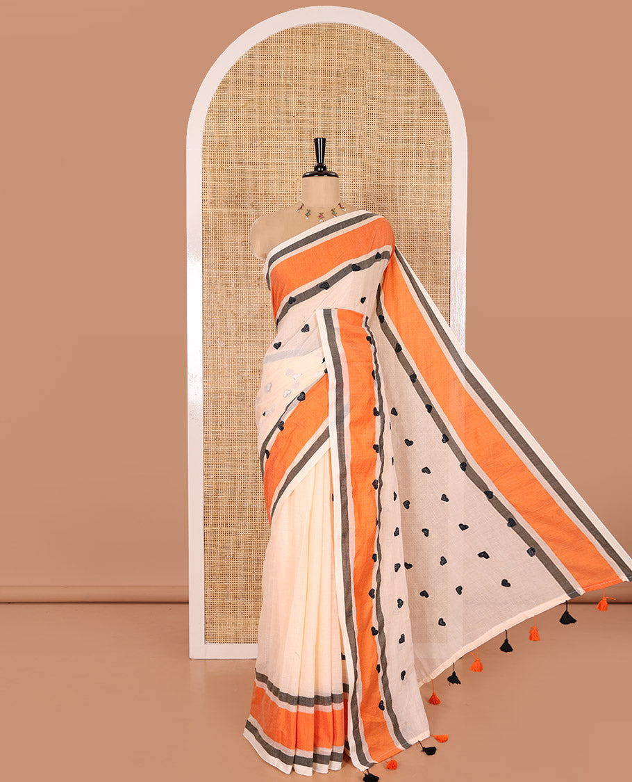 Peach Khadi Mul Cotton Saree Mesmerized with Heart Motifs Embroidery All Over Its Body, Complemented by a Contrast Plain Border, Pallu Steeped with Heart Motifs Embroidery, and Paired with a Matching Blouse