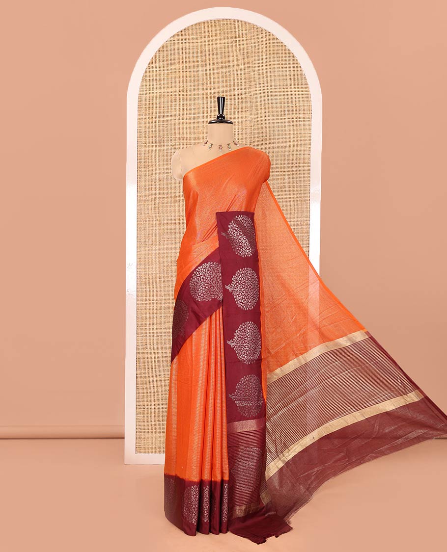 Orange Tissue-Cotton Blended Saree, Subtly Sparkled with Vertical Stripes on Its Body, Complemented by Contrast Border of Tree Motifs Woven, a Pallu Steeped with Zari Stripes, and Paired with a Contrast Blouse