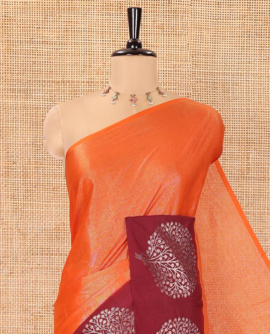 Orange Tissue-Cotton Blended Saree, Subtly Sparkled with Vertical Stripes on Its Body, Complemented by Contrast Border of Tree Motifs Woven, a Pallu Steeped with Zari Stripes, and Paired with a Contrast Blouse