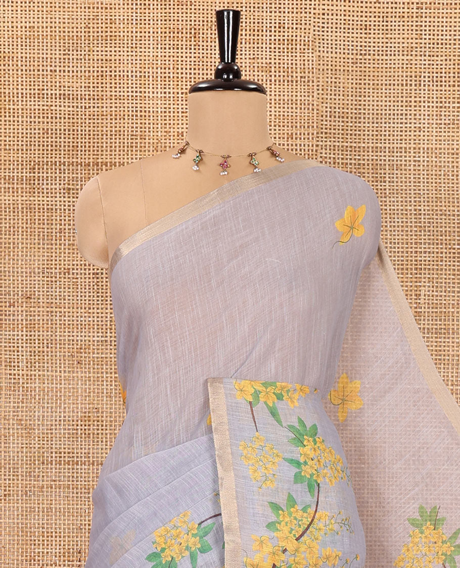 Grey Linen Saree, Enthralled with Averrhoa Carambola-Style Floral Motifs Print, Subtle Piping Border, Pallu Mirrors the Same Print, and Paired with a Matching Blouse