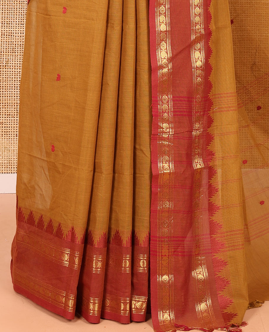 Mustard Chettinad Cotton Saree, Subtly Sparkled with Paisley Buttas All Over Its Body, Complemented by a Contrast Temple Rettai Pettu Traditional Zari Design Border, Pallu of Stripes and Buttas, and Paired with a Matching Blouse