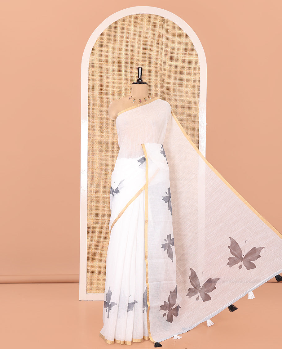 White Linen Cotton Saree, Enthralled with Butterfly Buttas All Over Its Body, Subtle Piping Border, Pallu of Butterfly Print, and Paired with a Contrast Fairy Motifs Printed Blouse