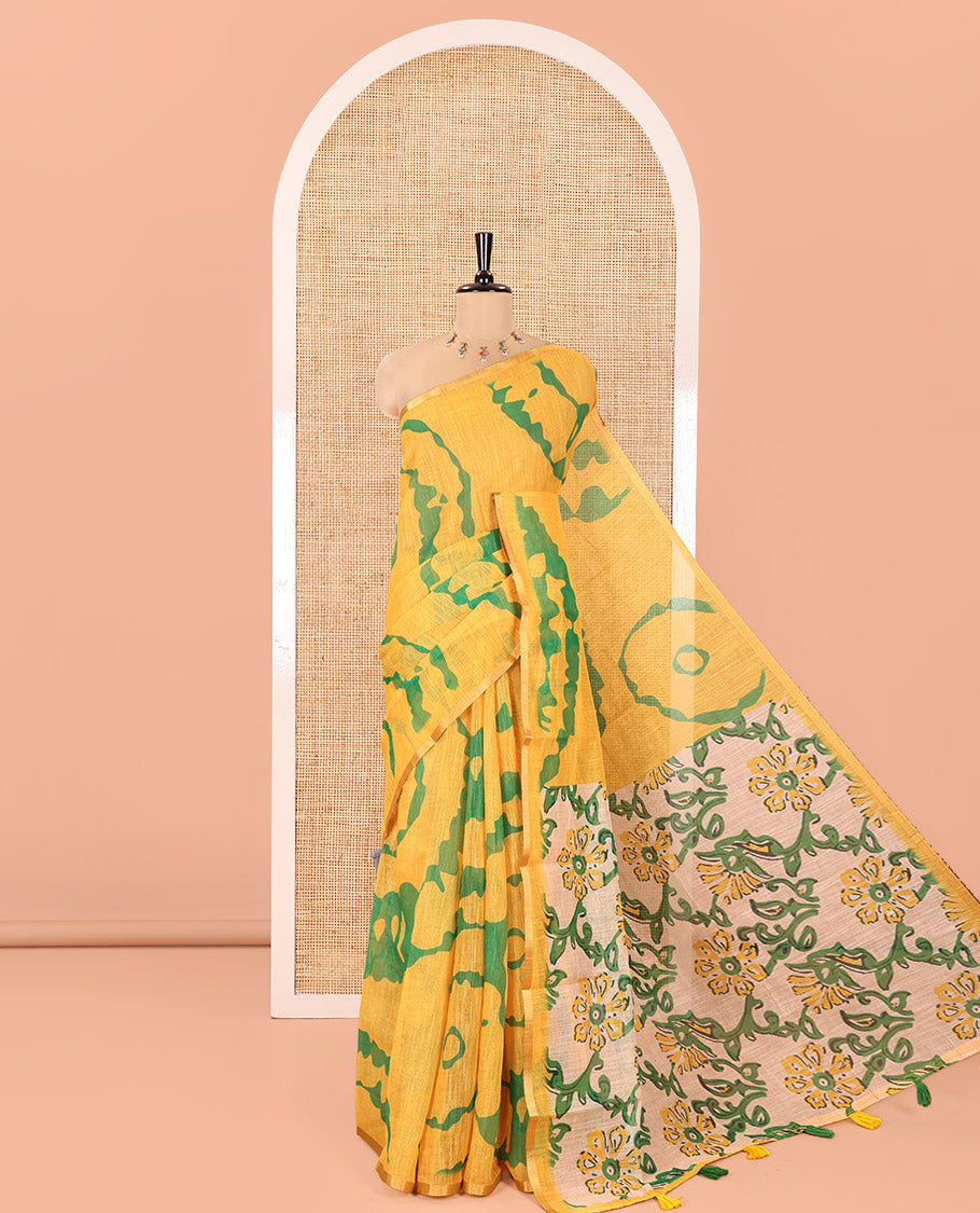 Yellow Linen Cotton Saree, Accentuated with Shibori Printed on Its Body, Subtle Piping Border, Pallu of Floral Vine Print, and Paired with a Contrast Floral Vine Printed Blouse