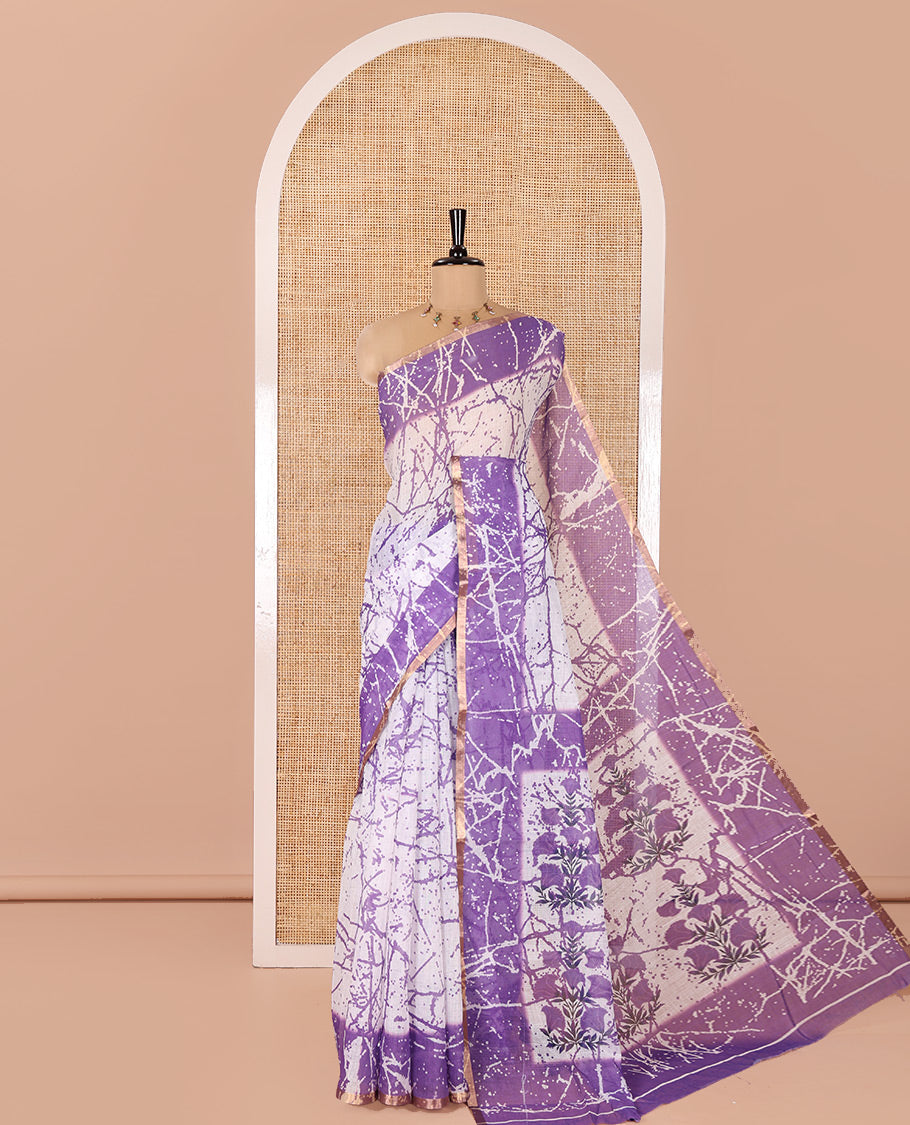 Cream and Lavender Linen Cotton Saree, Decked Up with Batik Print on Its Body, Complemented by Contrast Batik Printed Border, Pallu of Floral Print, and Paired with a Contrast Blouse
