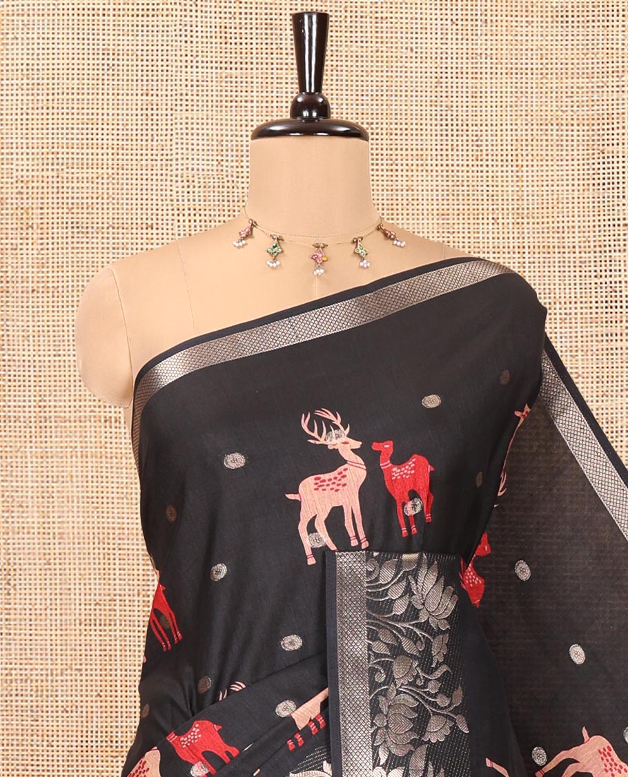 Black Semi-Tussar Saree, Beautified with Round Buttas and Deer Buttas All Over Its Body, Highlighted by a Zari Border of Pichwai Lotus Design, Pallu of Lotus and Deer Motifs, and Paired with a Matching Blouse