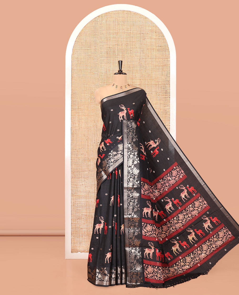 Black Semi-Tussar Saree, Beautified with Round Buttas and Deer Buttas All Over Its Body, Highlighted by a Zari Border of Pichwai Lotus Design, Pallu of Lotus and Deer Motifs, and Paired with a Matching Blouse