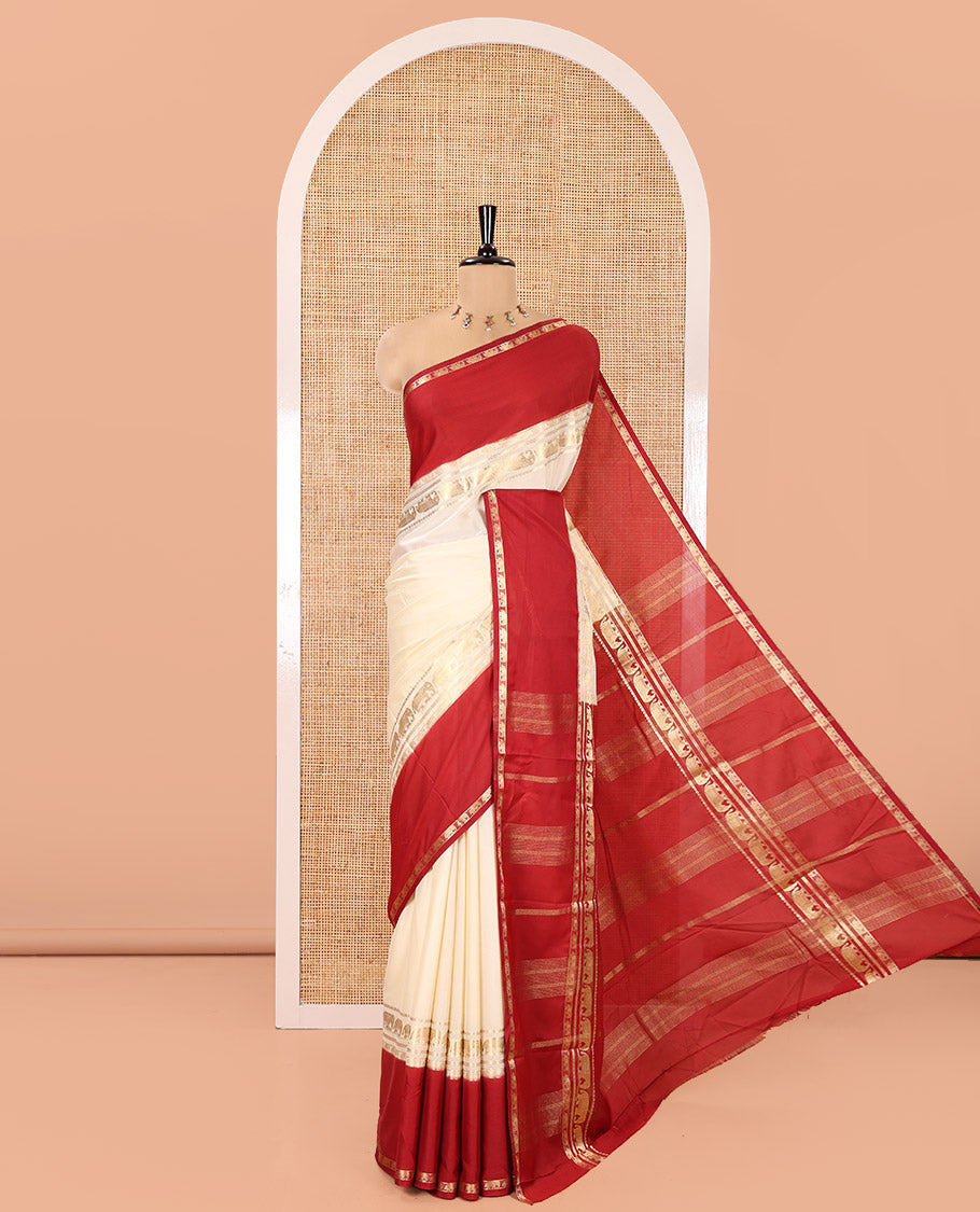 Cream Plain Art Mysore Silk Saree, Complemented by Captivating Contrast Rettai Pettu Traditional Border of Elephant Zari Buttas, Striped Pallu, and Paired with a Contrast Blouse