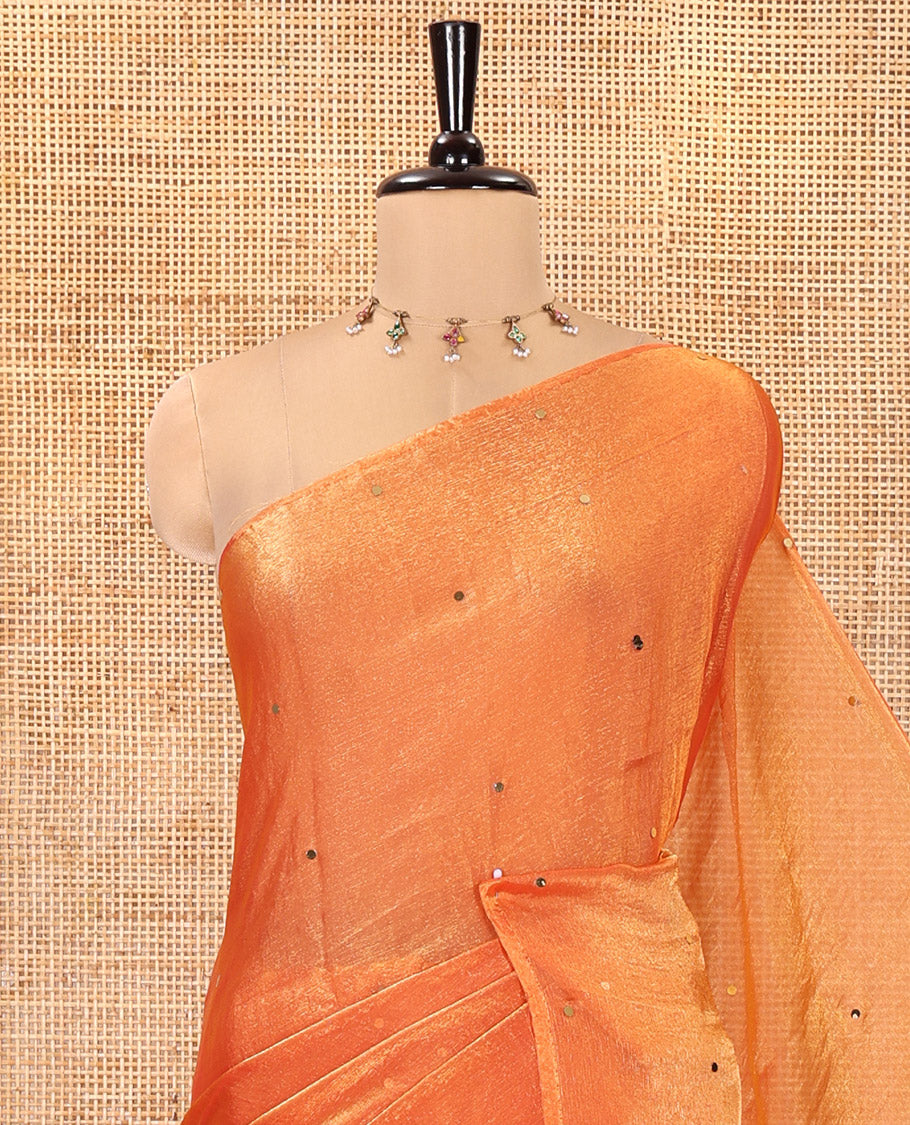 Borderless Orange Fendy Chiffon Saree, Gleamed Up with Sequin Work on Its Body, Highlighted by a Self-Pallu of Sequin Work, and Paired with a Matching Blouse