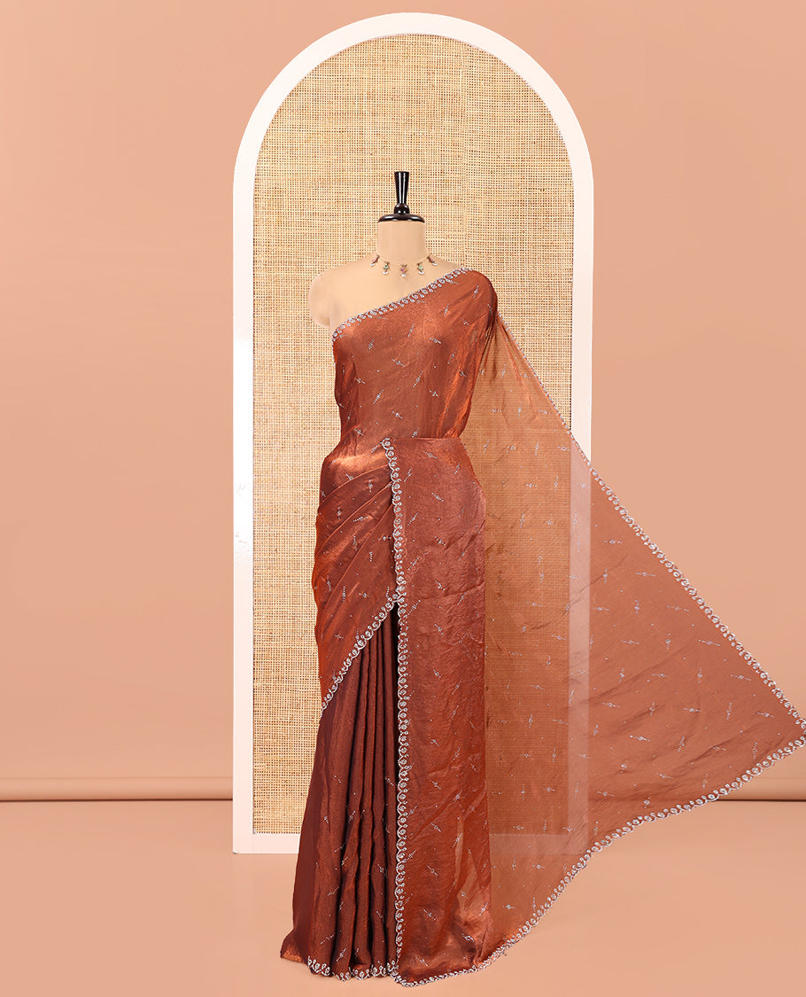 Maroon Fendy Chiffon Saree, Highlighted by Swarovski Stone Work All Over the Body, Gleaming Swarovski Stone Work Border, a Self-Pallu, and Paired with a Fancy Designer Blouse