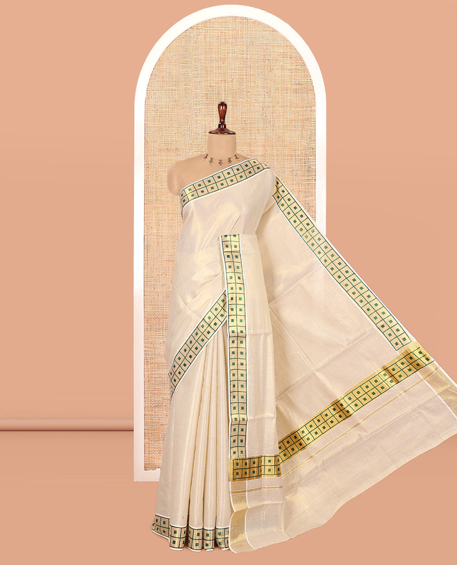 Gold-Green Plain Kerala Tissue Saree Features a Butta Enclosed Checked Border, and a Matching Blouse