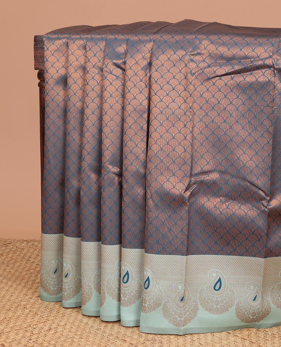 Peacock color copper zari design litchi soft silk saree with contrast mango meena butta border & rich pallu along with brocade blouse