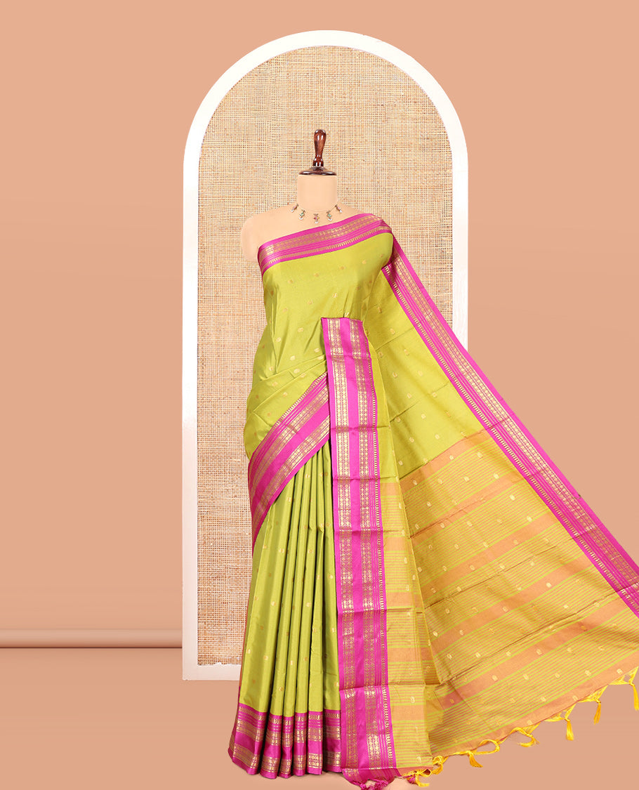 Parrot Green-Purple Softy Silk Saree, Adorned with Zari Buttas, a Contrast Traditional Zari Border, and a Matching Blouse