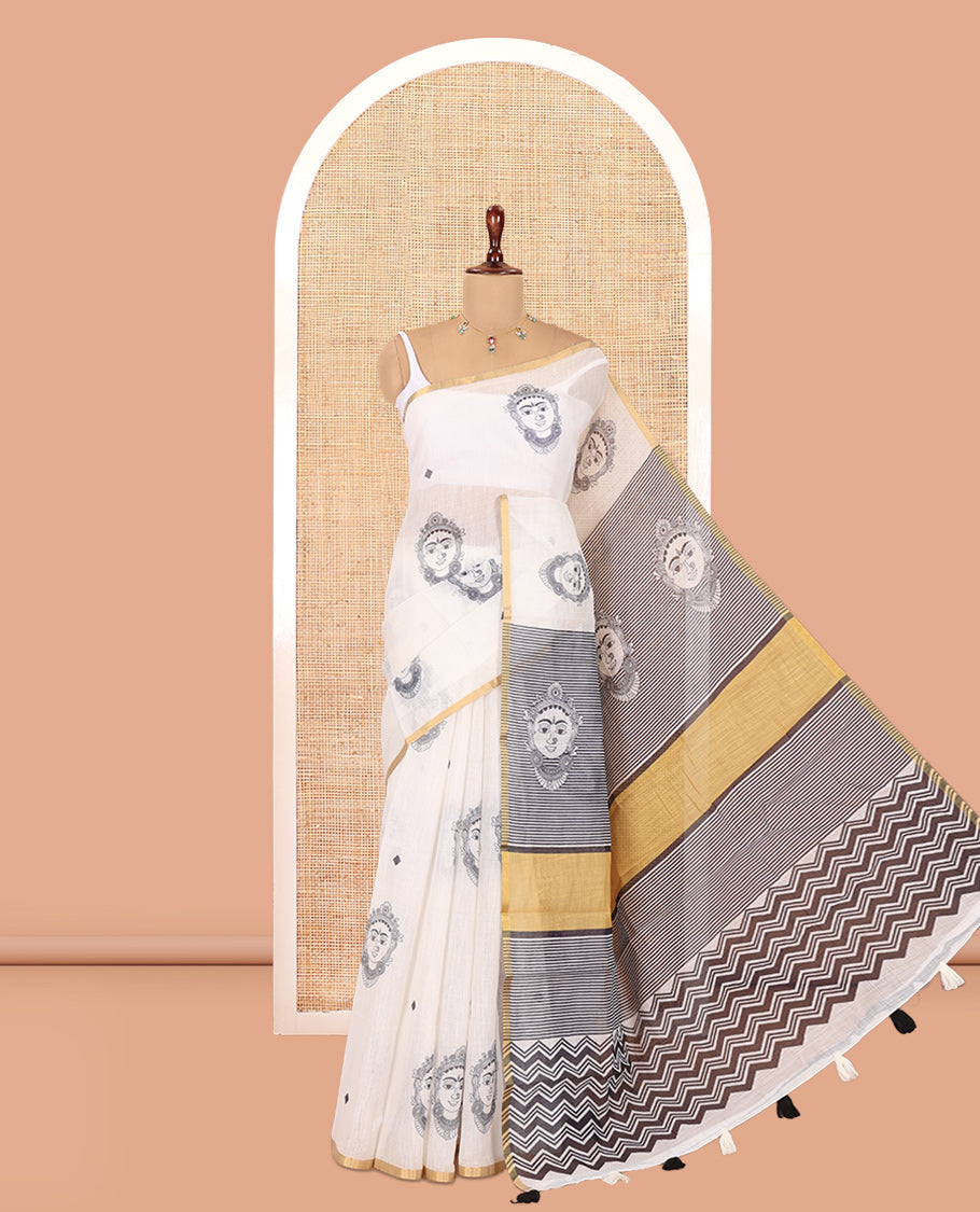 Borderless Cream Linen Cotton Saree, Adorned with Face Print, Contrast Pallu of Chevron Stripes and Face Print, a Contrast Blouse