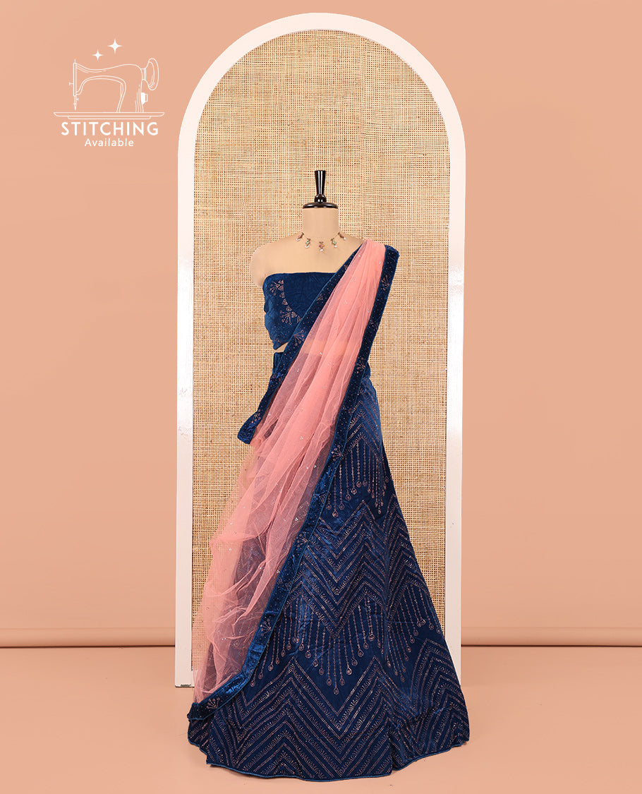 Blue Velvet Half-Saree, gleamed up with Swarovski Stonework Skirt, Matching Stonework Blouse, and Net Stonework Dhavani