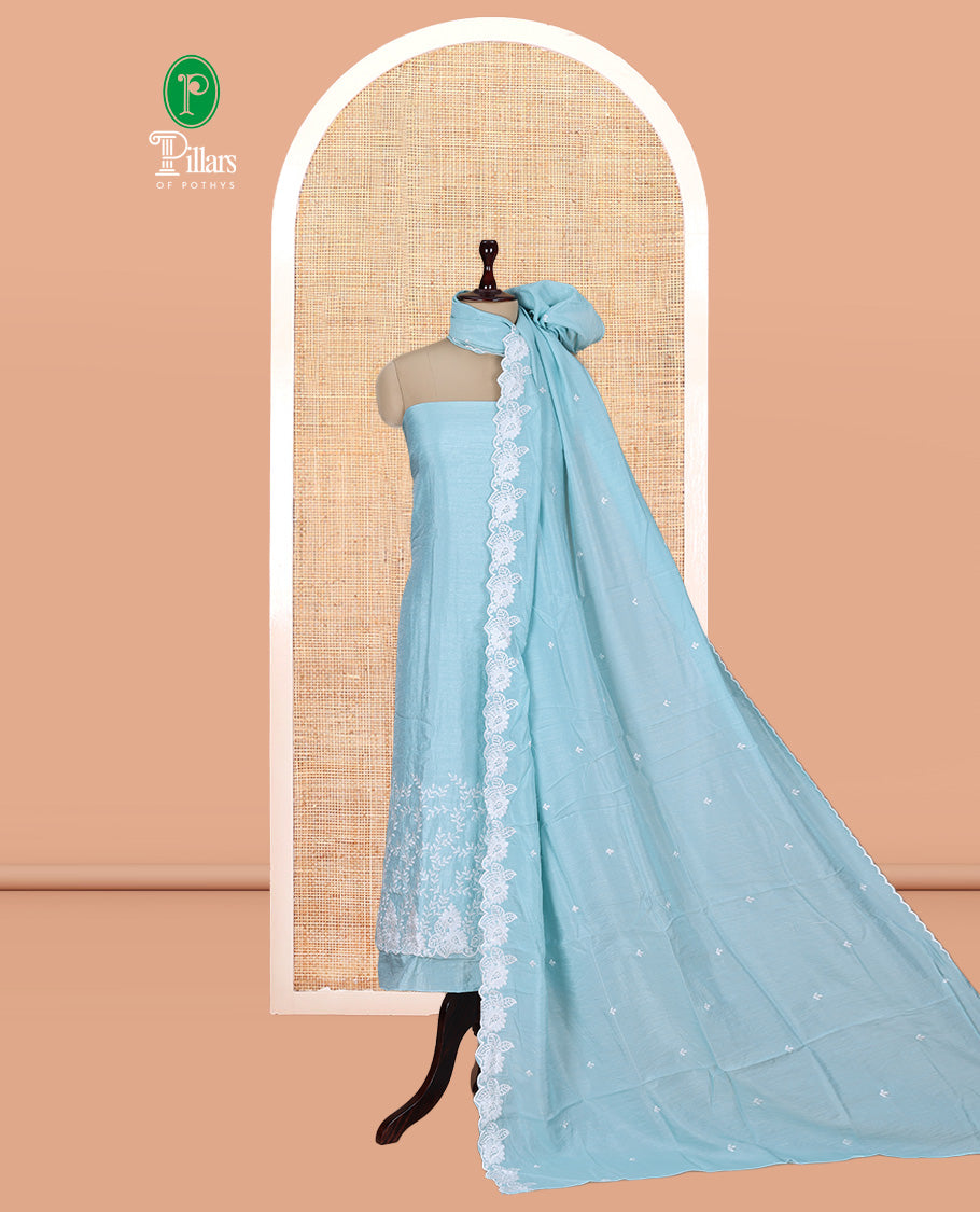 Sea Blue Mul Chanderi Material Churidar with Delicate Floral Embroidered Top, a Plain Bottom, and Scallop Embroidered Dupatta