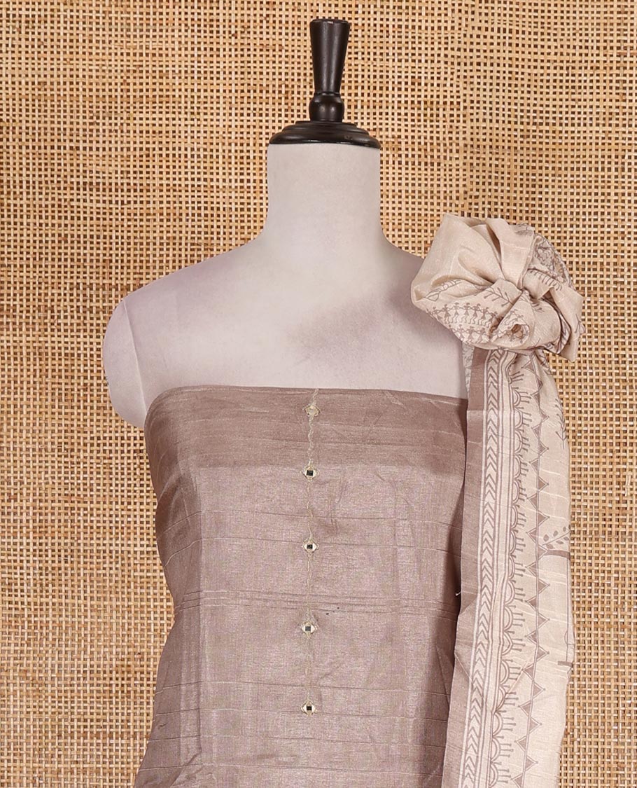 Fawn material churidar set, warli tribe village theme print with mirror work semi-tussar top, plain bottom, and warli tribe village theme print semi-tussar dupatta