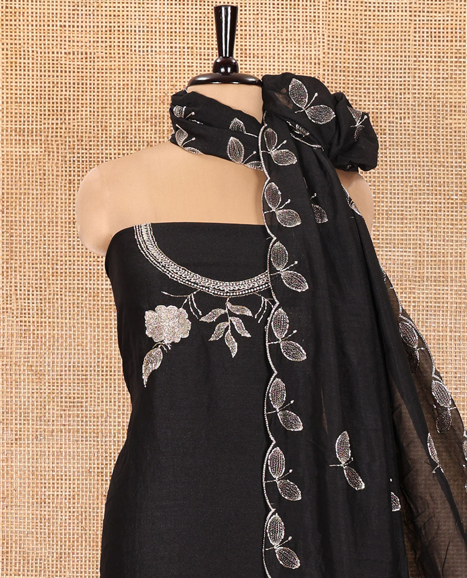 Black Material Chudidhar Set, Ornamented with an Floral Motifs Embroidered on its Vichitra Silk Top, Plain Santoon Bottom, and Vichitra Silk Dupatta of Leaf Motifs Embroidery