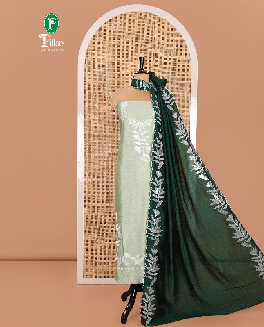Pista Green Material Churidar Set, Detailed with Floral Motifs Sequins-Thread Embroidered on Its Vichitra Silk Top, Comes with a Contrast Santoon Bottom, and Paired with a Vichitra Silk Floral Embroidered Scallop Dupatta