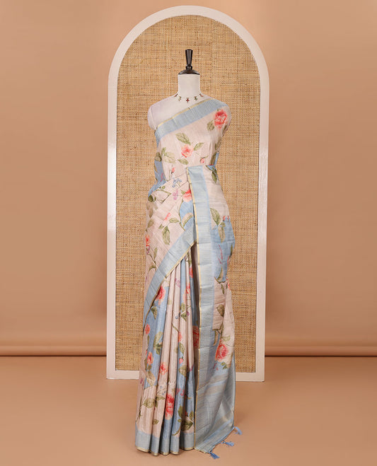 Sky blue floral-leaf printed fancy tussar silk saree, zari woven border & zari striped pallu & matching stripes & floral printed blouse