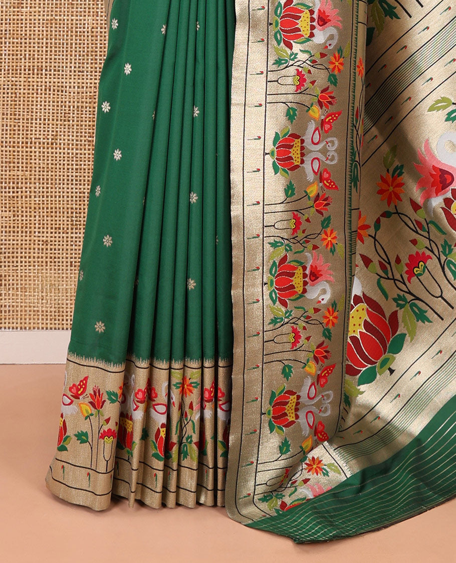 Bottle green floral buttas art silk paithani saree, contrast floral, bird, and muniya border, pallu of floral and bird designs and a matching blouse