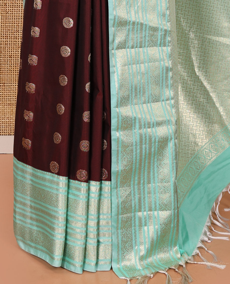 Maroon Kanchipuram Budget Silk Saree, Adorned with Peacock Chakram Buttas All Over Its Body, Complemented by a Contrast Traditional Zari Border of Floral-Bird Designs, Pallu Enriched with Geometric Patterns, and Paired with a Matching Blouse