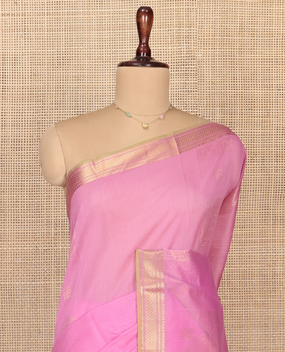 Pink Silk Cotton Saree, Sparsely Woven with Geometric Buttas All Over Its Body, Highlighted by Traditional Zari Designs Woven Border, Intricately Designed Pallu and Paired with a Matching Blouse