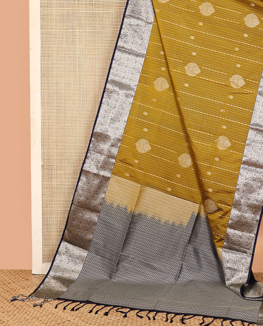 Yellow dotted stripes, and buttas soft silk saree, contrast traditional zari border, and scallop design pallu