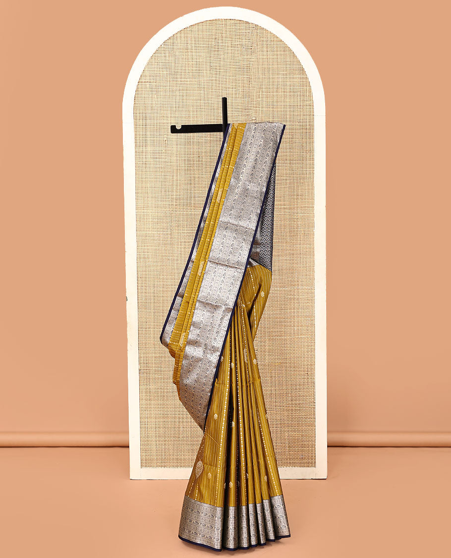 Yellow dotted stripes, and buttas soft silk saree, contrast traditional zari border, and scallop design pallu