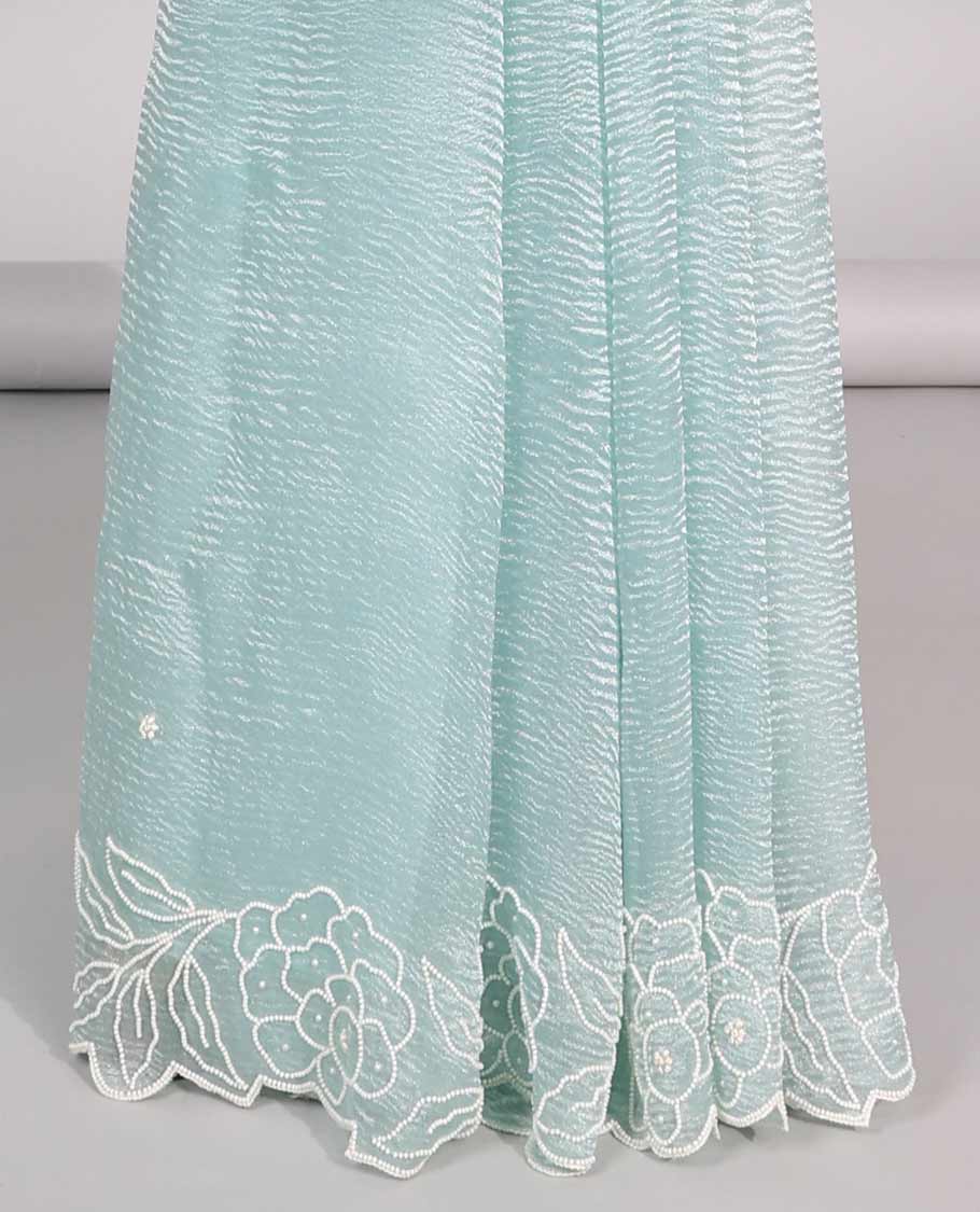 Light blue floral bead embroidery tissue saree with floral scallop bead embroidery border