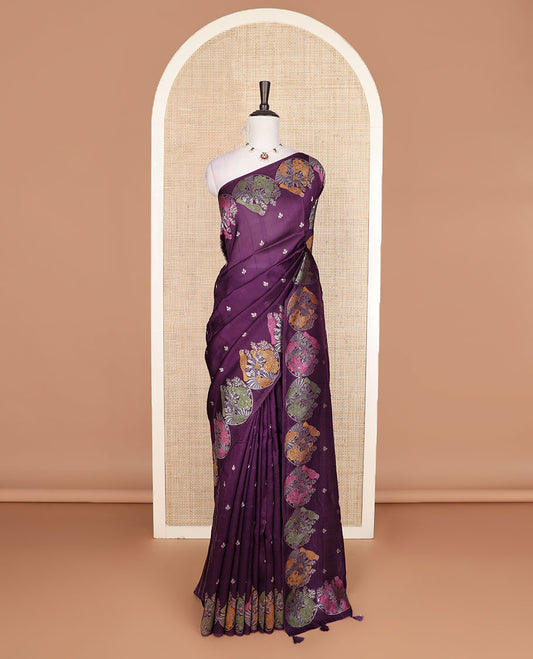 Purple  Matka silk saree features rudraksham motifs, scallop floral motifs and bird embossed thread embroidery border