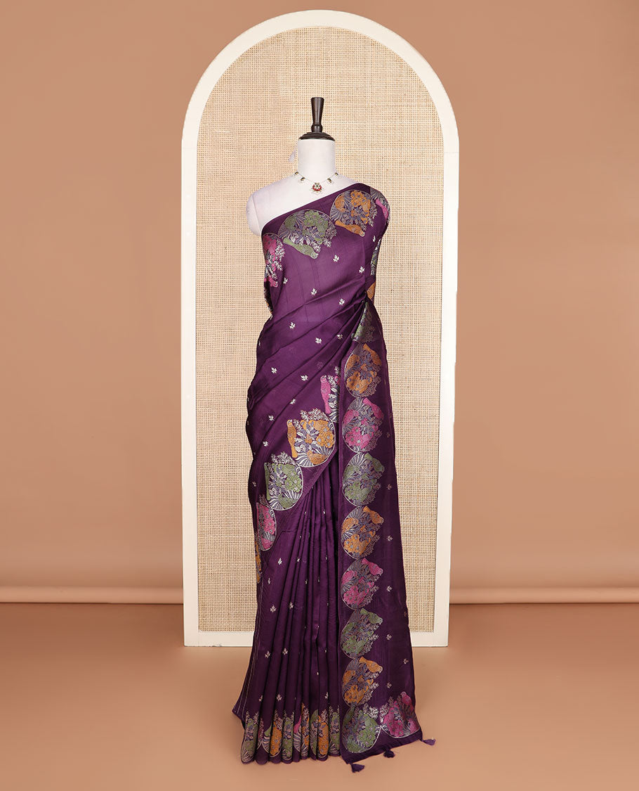 Purple Matka silk saree features rudraksham motifs, scallop floral motifs and bird embossed thread embroidery border