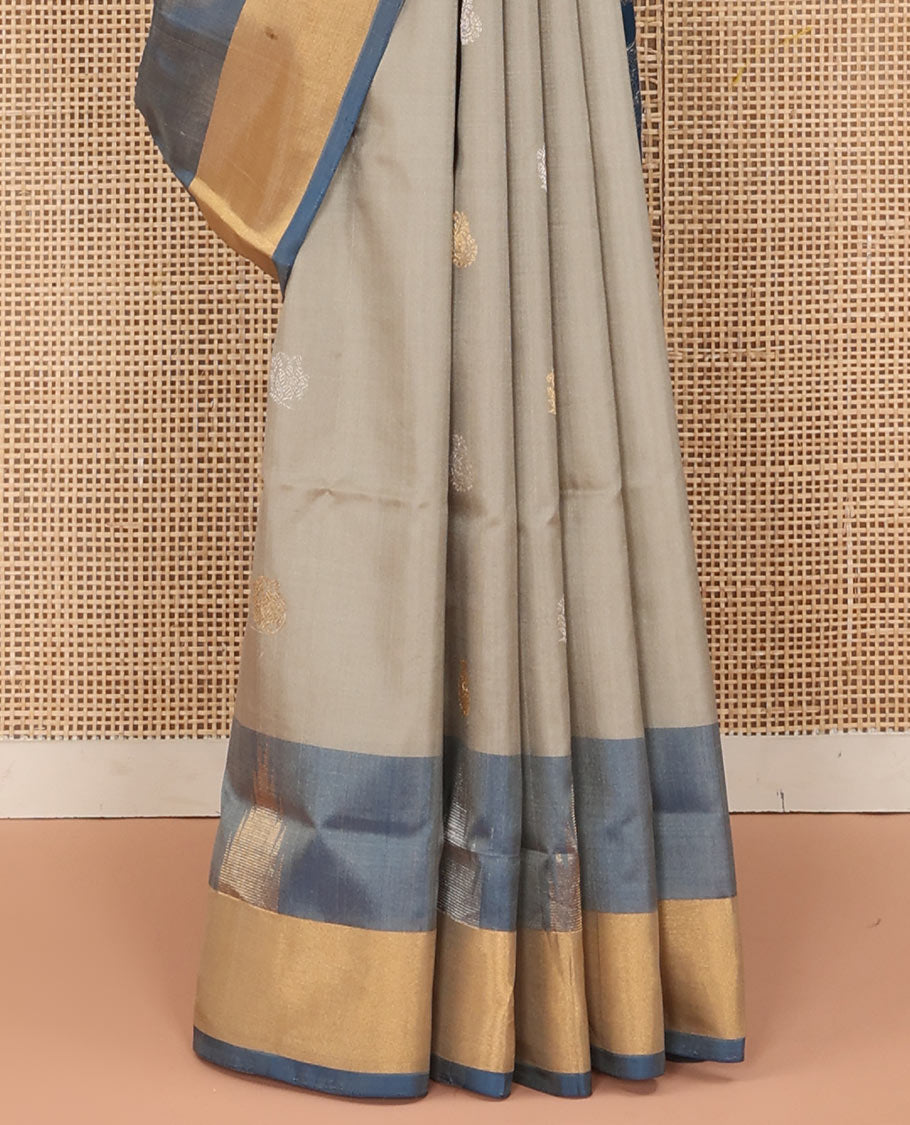 Grey Uppada Silk Saree Featuring Zari Buttas, Contrast Sparsely Woven Temple Border, Pallu Decked Up with Floral-Geometric Designs, and Paired with a Contrast Blouse