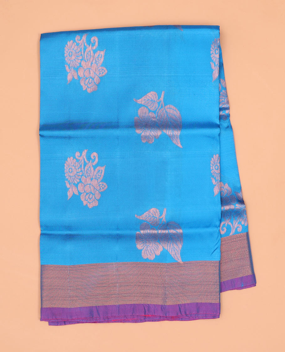 Blue flower motifs semi-uppada saree with contrast zari border & floral zari design pallu