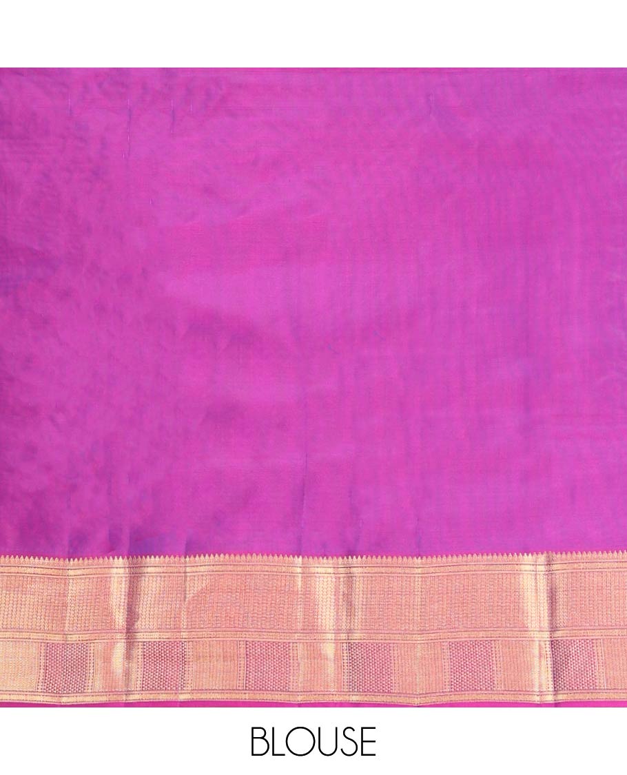 Blue Vasundhara Lite-Silk Mix Saree Highlighted with Zari Buttas on Its Body, Complemented by a Contrast Border of Thilakam Mokku, Ara Maadam, Vanki, and Then Kuli Kann Designs, Pallu Elevated with Jaal Designs, and Paired with a Contrast Blouse