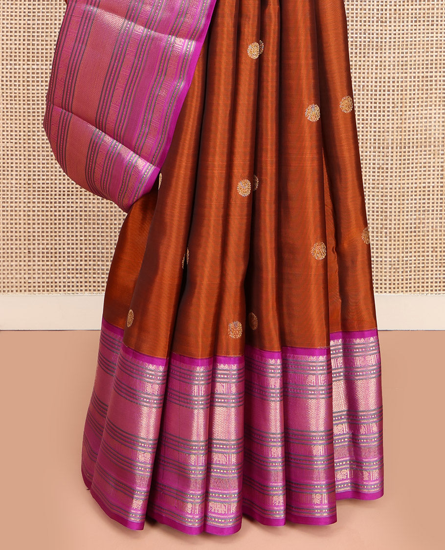 Rust Orange Vasundhara Lite Silk Mix Saree, Showcasing with Zari Buttas, Complemented by a Contrast Border of Thilakam Mokku, Banaras, Mayil, Yaanai, and Mayil Kann Designs, Artfully Detailed Pallu of Jaal Designs, and Paired with a Contrast Blouse