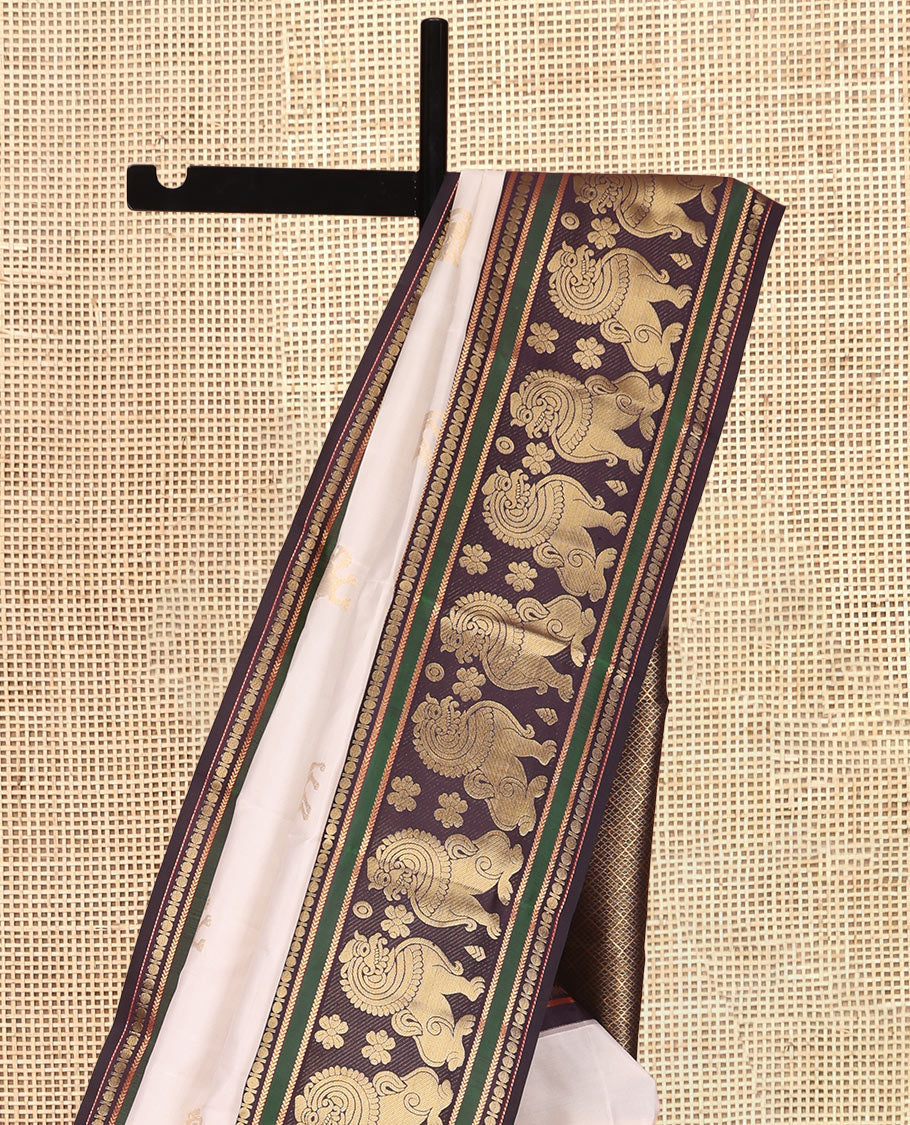 Cream Vasundhara Lite Silk Mix Saree, Woven with Yaali Buttas, a Contrast Singam Border, Grand Jaal Pallu, and a Contrast Blouse