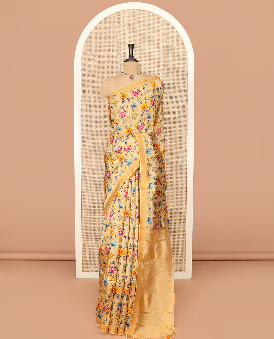 Sandal Banana Pith Saree Adorned with Colorful Floral Motifs Print, Subtle Zari Border, Gleaming Zari Striped Pallu, and Paired with a Contrast Floral Printed Blouse