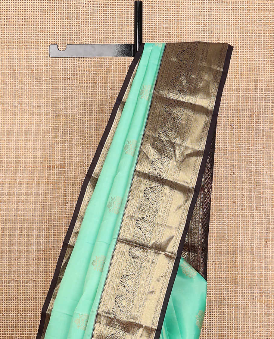 Turquoise floral buttas silk saree, contrast jaal pallu & border of rekku,manga,lavangam,kathir & zari stripes