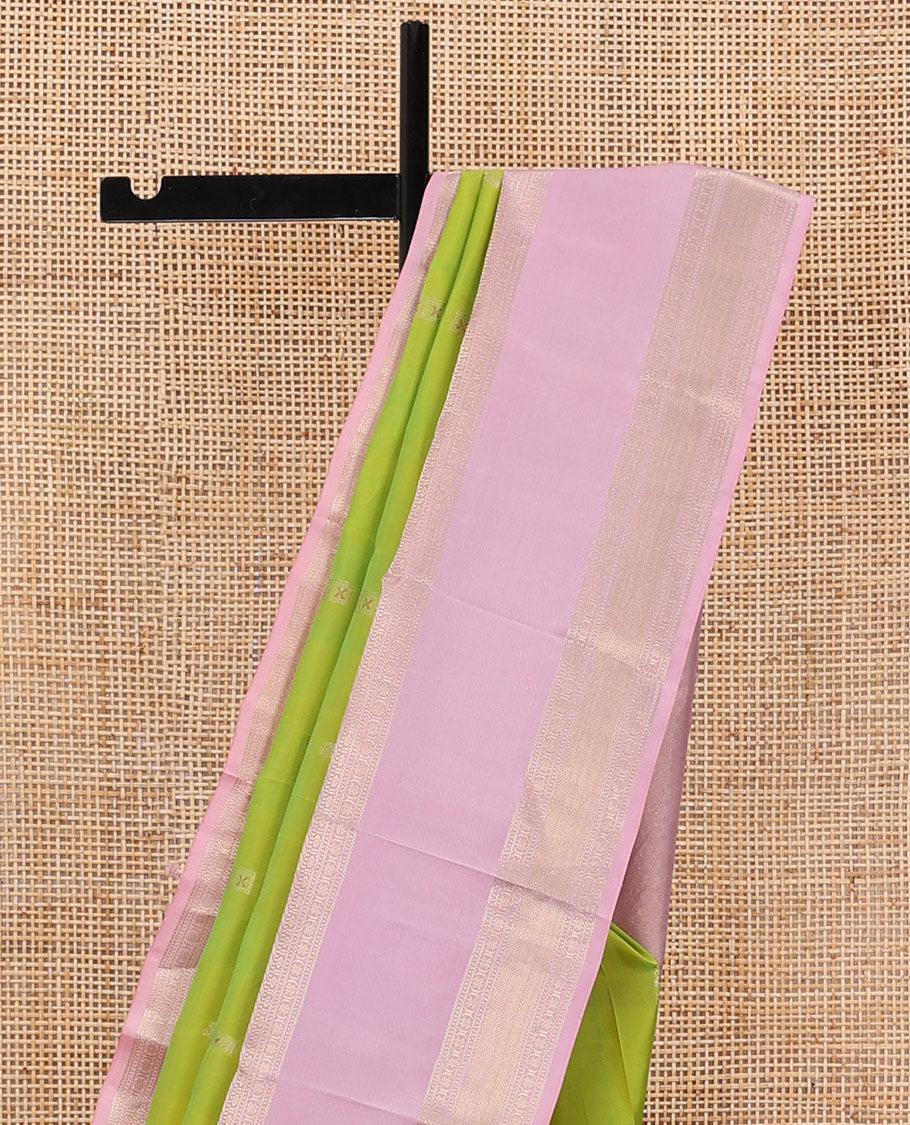 Parrot green meena buttas silk saree, contrast pink rettai pettu border of thilakam mokku,banaras,muthu,kathir & kodi visiry