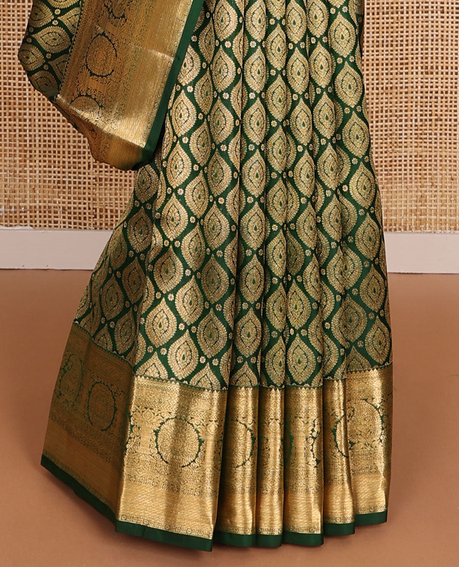 Green jacquard wedding silk saree, zari border of thilakam,kathir,poun,kamalam, chakram & manga & geometric patterned pallu