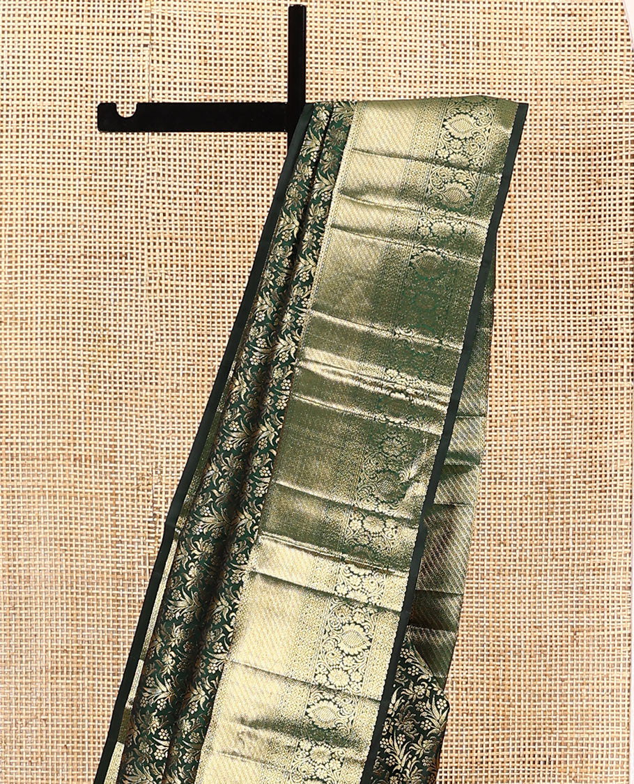 Green jacquard kanchipuram silk saree, zari border of thilakam, greek key, and kodi visiry designs, and intricate pallu