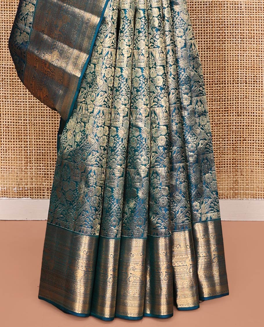 Blue Kanchipuram Wedding Silk Saree, Meticulously Crafted with Jacquard Design on Its Body, Highlighted by Zari Border of Cross Kamalam, Kodi Manga, Muthu, Kathir, Mayil Kann, and Yaali Designs, Chakram Design Pallu, and Paired with a Matching Blouse