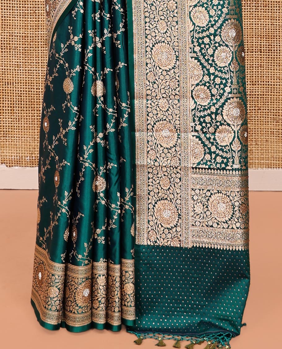 Green Banarasi Satin Saree, Embellished with Floral Jaal Jacquard, a Floral Creeper Border, Intricate Stonework Pallu, and a Matching Blouse