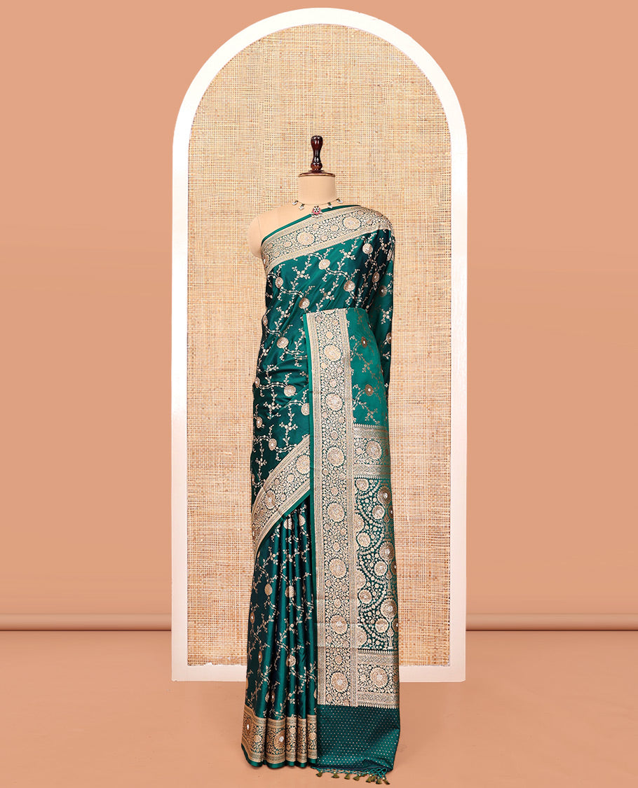 Green Banarasi Satin Saree, Embellished with Floral Jaal Jacquard, a Floral Creeper Border, Intricate Stonework Pallu, and a Matching Blouse