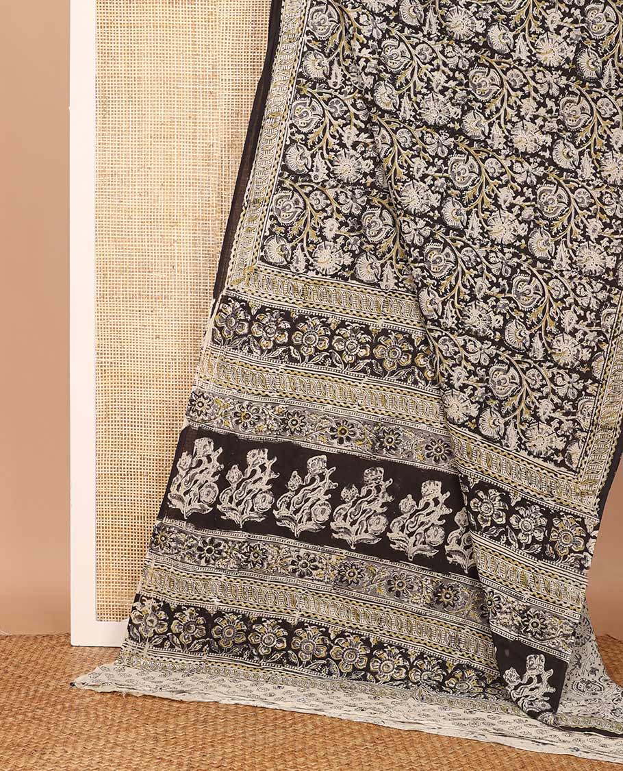 Black floral vine machine-printed Kalamkari cotton saree, geometric printed border, and pallu of floral print